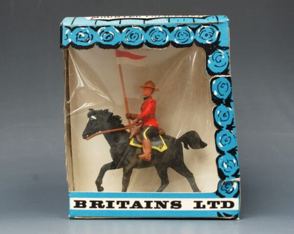 Eyes Right RCMP Mounted Trooper in Window Box